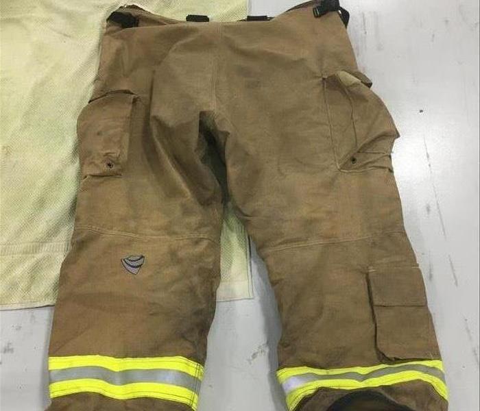image of dirty and dark fire fighter uniform pants