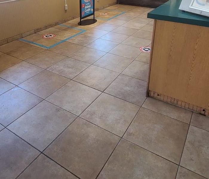The fast food lobby has their floor dried.