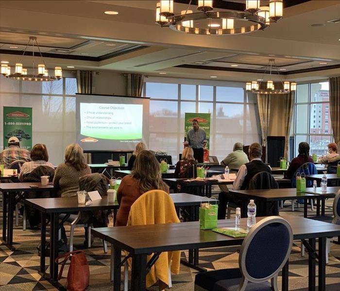 image of a room full of local Crawford County insurance agents taking a continuing education course offered by SERVPRO