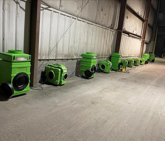 SERVPRO equipment is sitting in a warehouse.