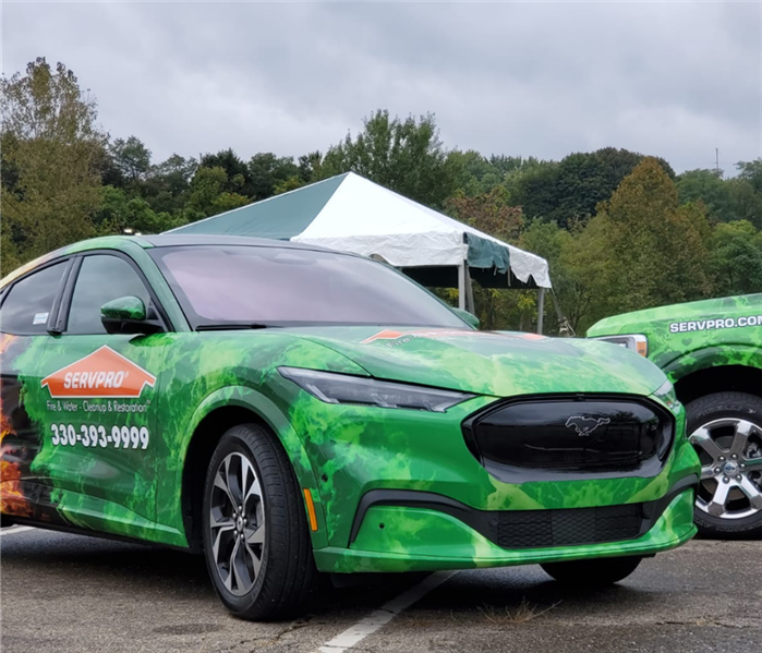 Mustang wrapped with SERVPRO logo.